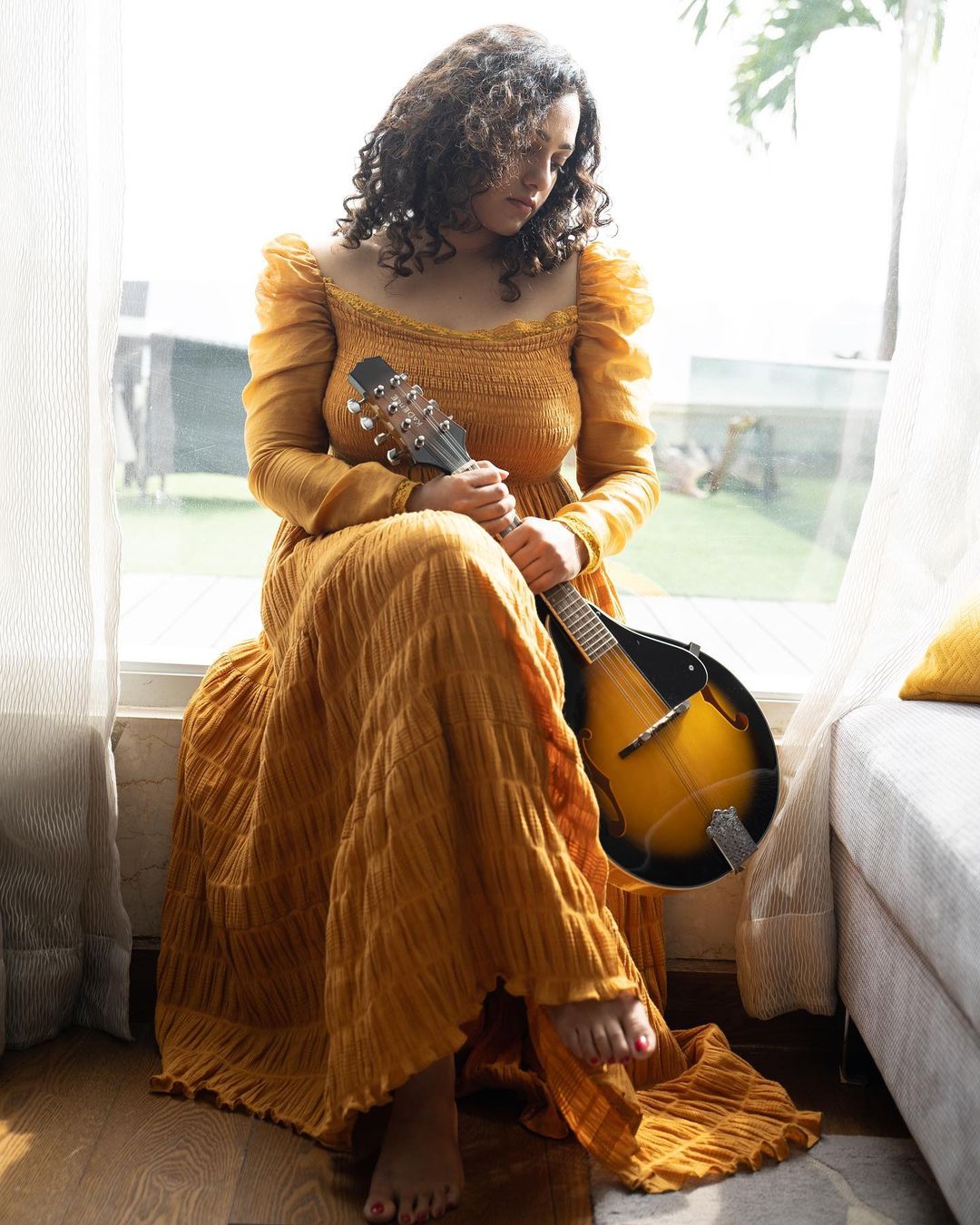 nithya-menon-instagram-trending-glamours-photo-shoot-in-yellow-colour-gown