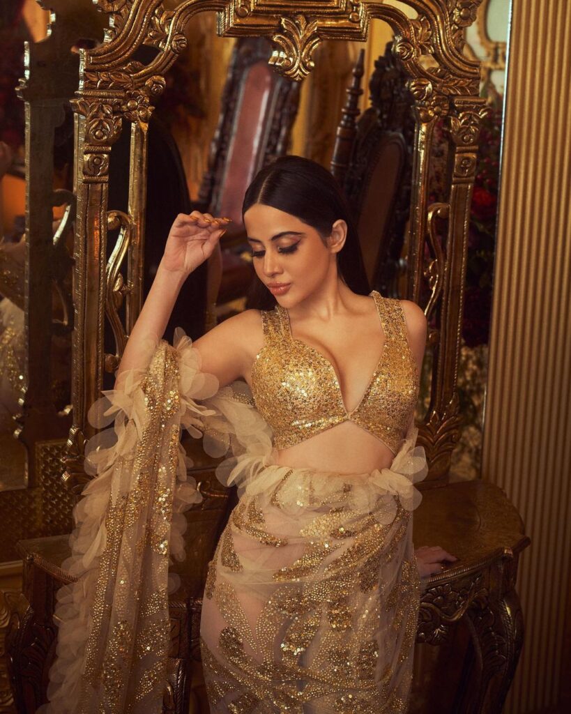 uorfi-javed-trendy-looks-in-golden-designer-saree-netizens-trolling